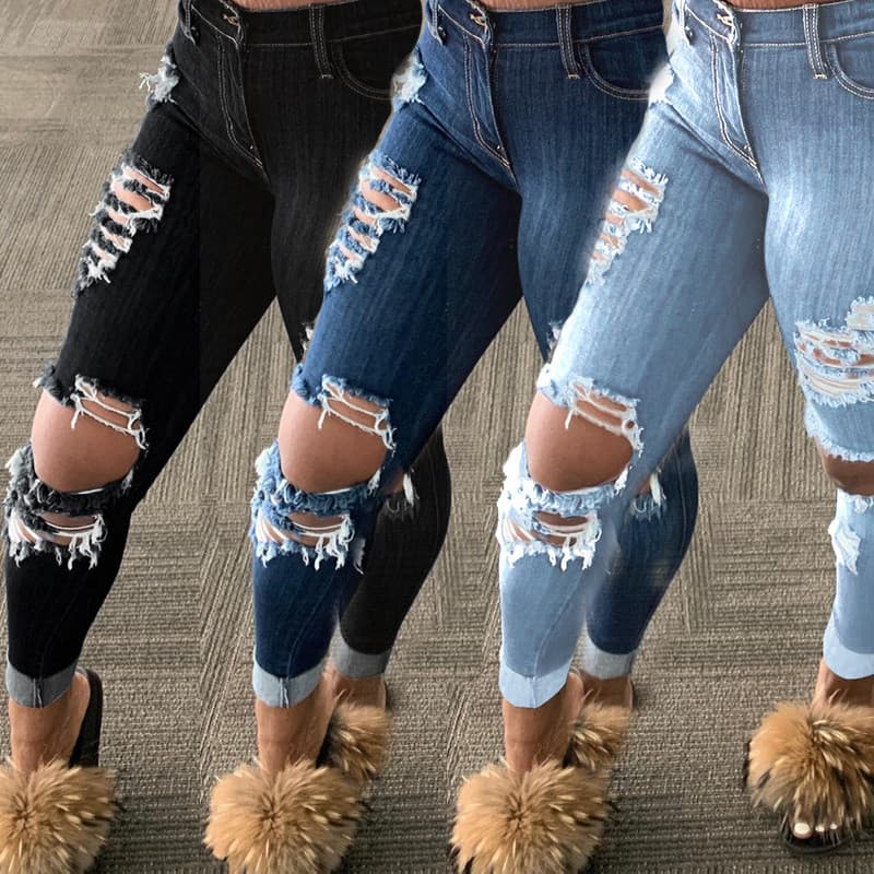 Calças jeans femininas com rasgos e modelagem fina